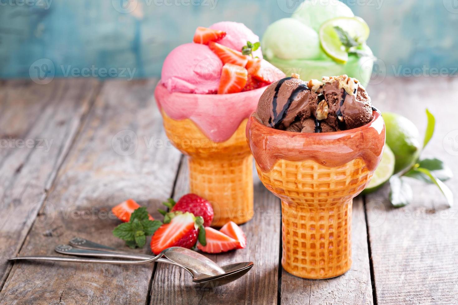 Variety of ice cream in bowls photo