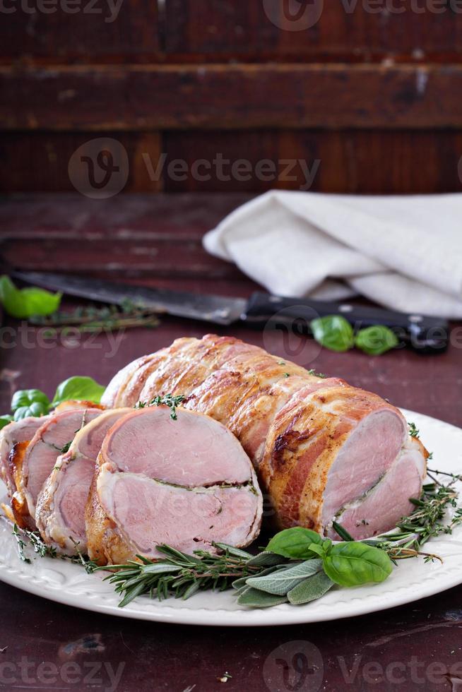 Roasted pork tenderloin with herbs photo