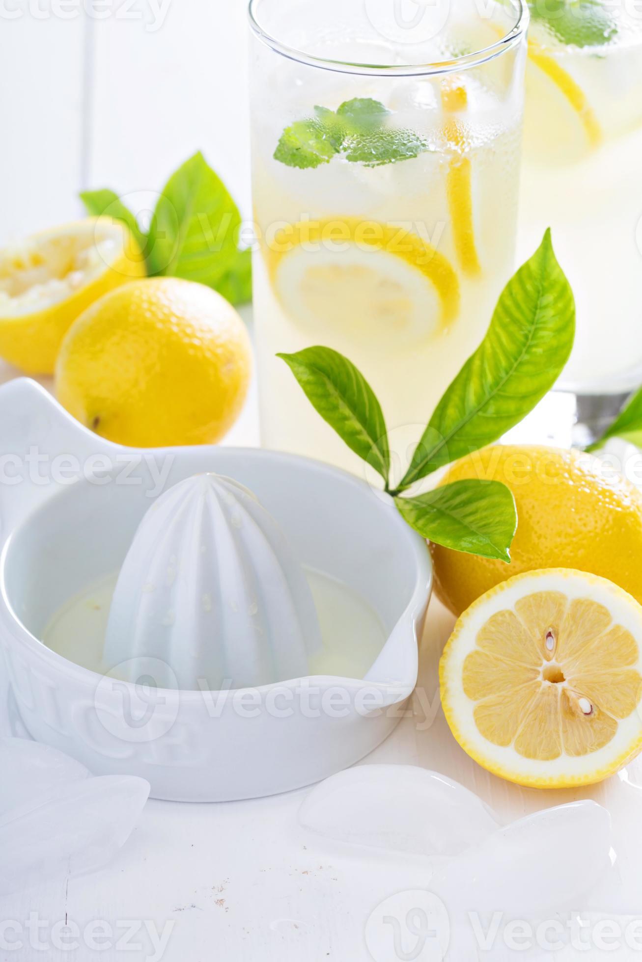 Making homemade lemonade with ceramic juicer 15701983 Stock Photo at