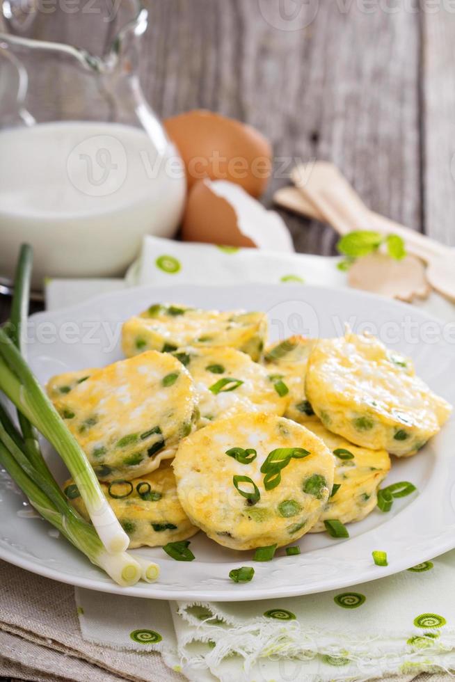 Mini frittatas with peas, green onion and feta photo