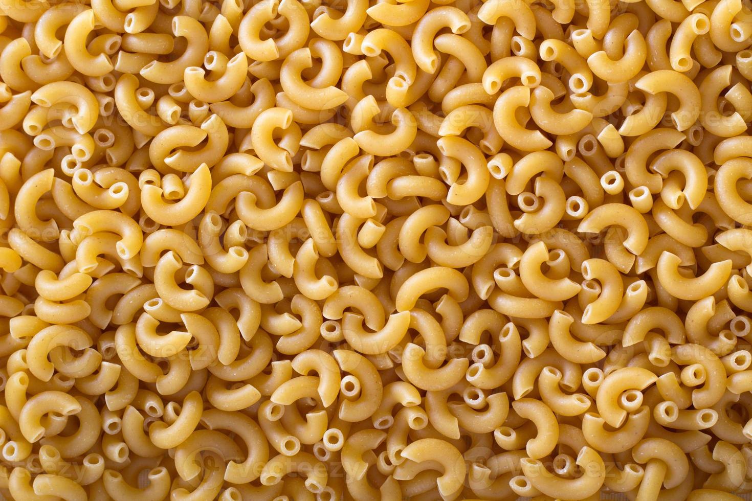 fondo de macarrones de codo de pasta foto