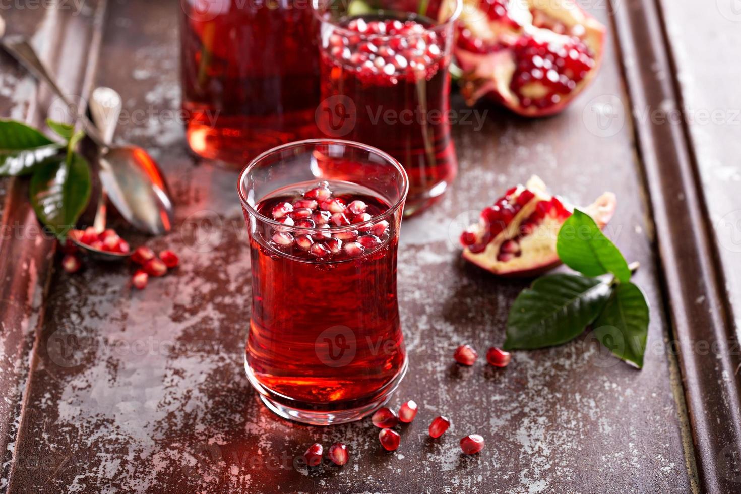 Pomegranate drink with sparkling water photo