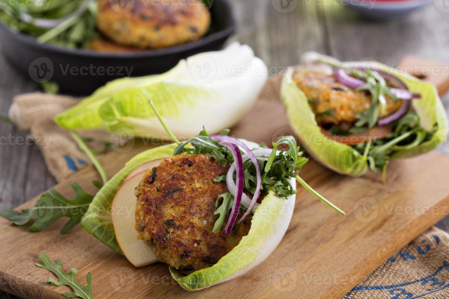 Vegan burgers with quinoa and vegetables photo