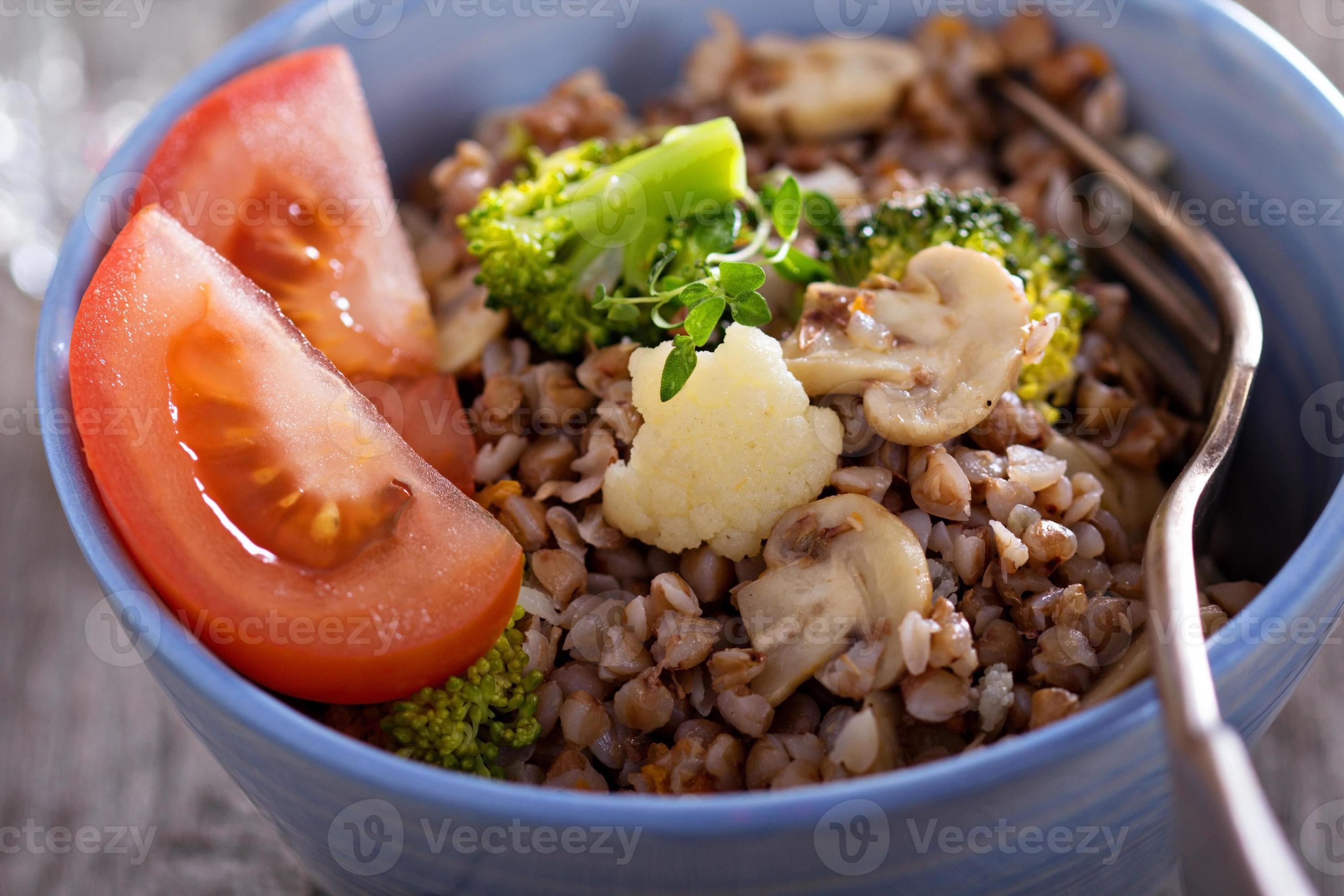 Buckwheat with mushrooms and vegetables 15703796 Stock Photo at Vecteezy