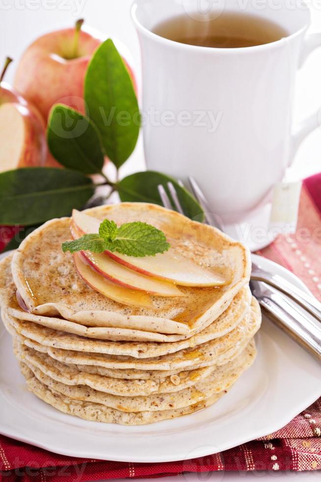 Stack of vegan pancakes with almond milk photo