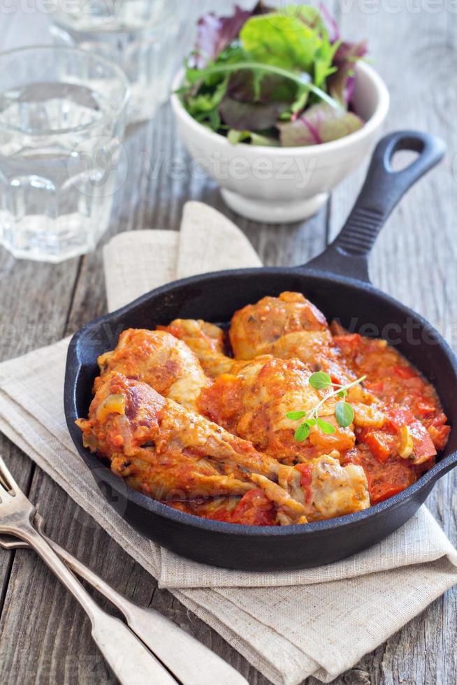 Chicken with mustard and red peppers photo