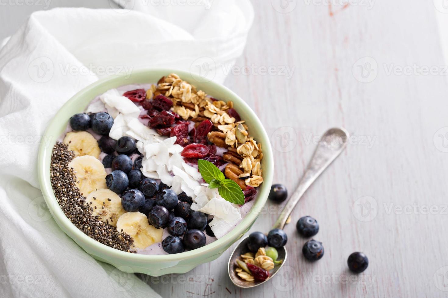 Smoothie bowl with chia, banana, blueberry photo