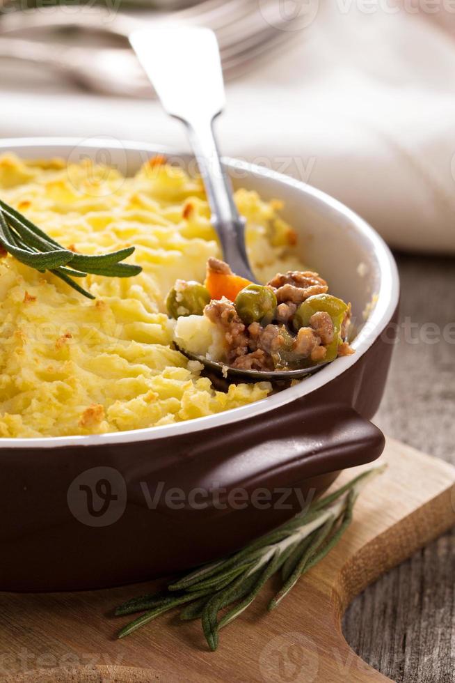 Sheperd's pie in a baking dish on the table photo