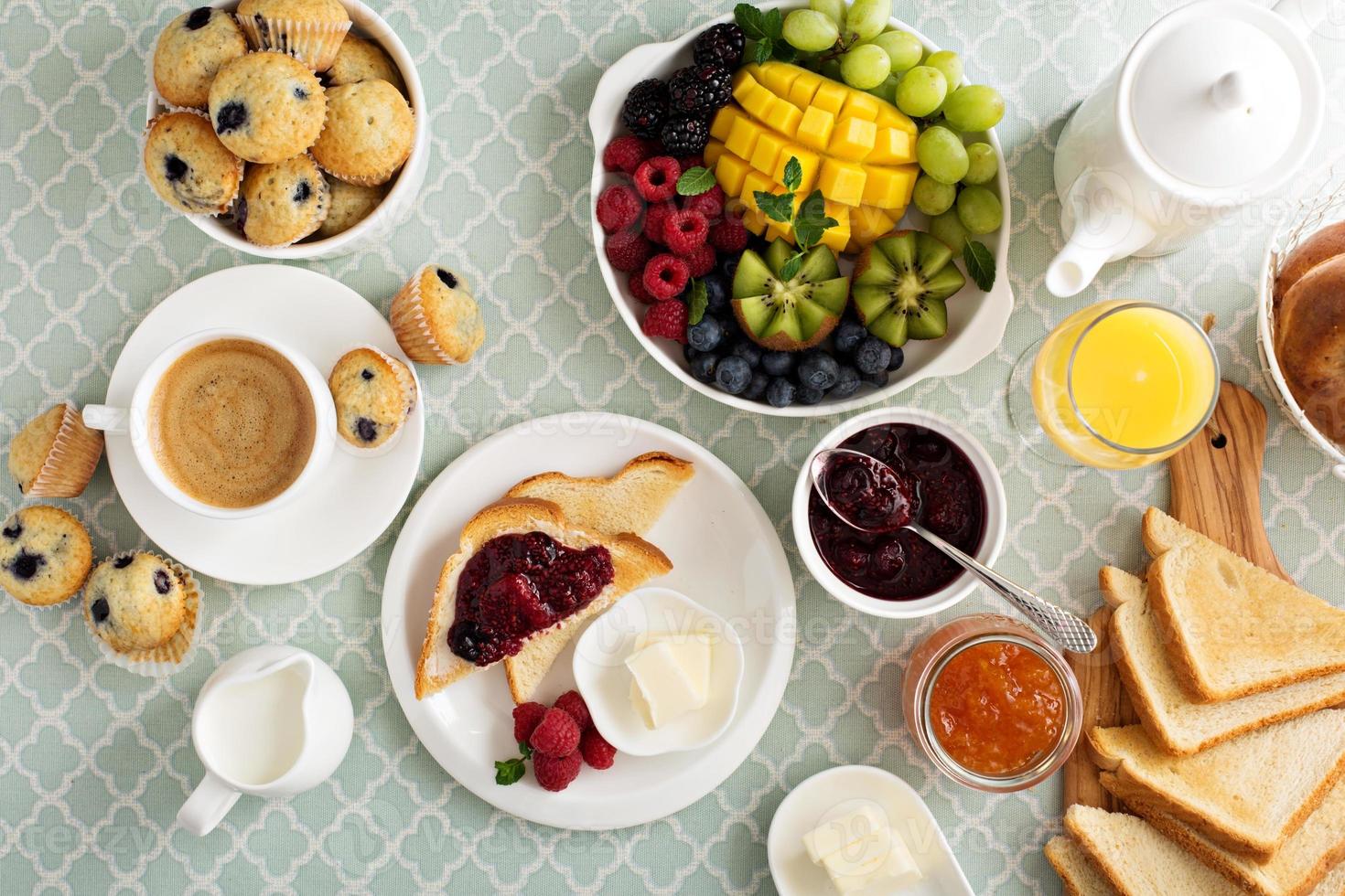 Fresh and bright continental breakfast table photo