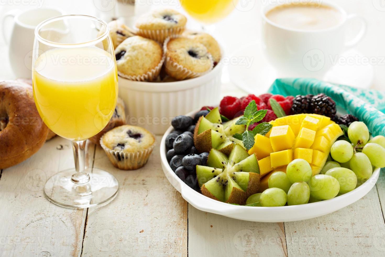 Fresh and bright continental breakfast table photo