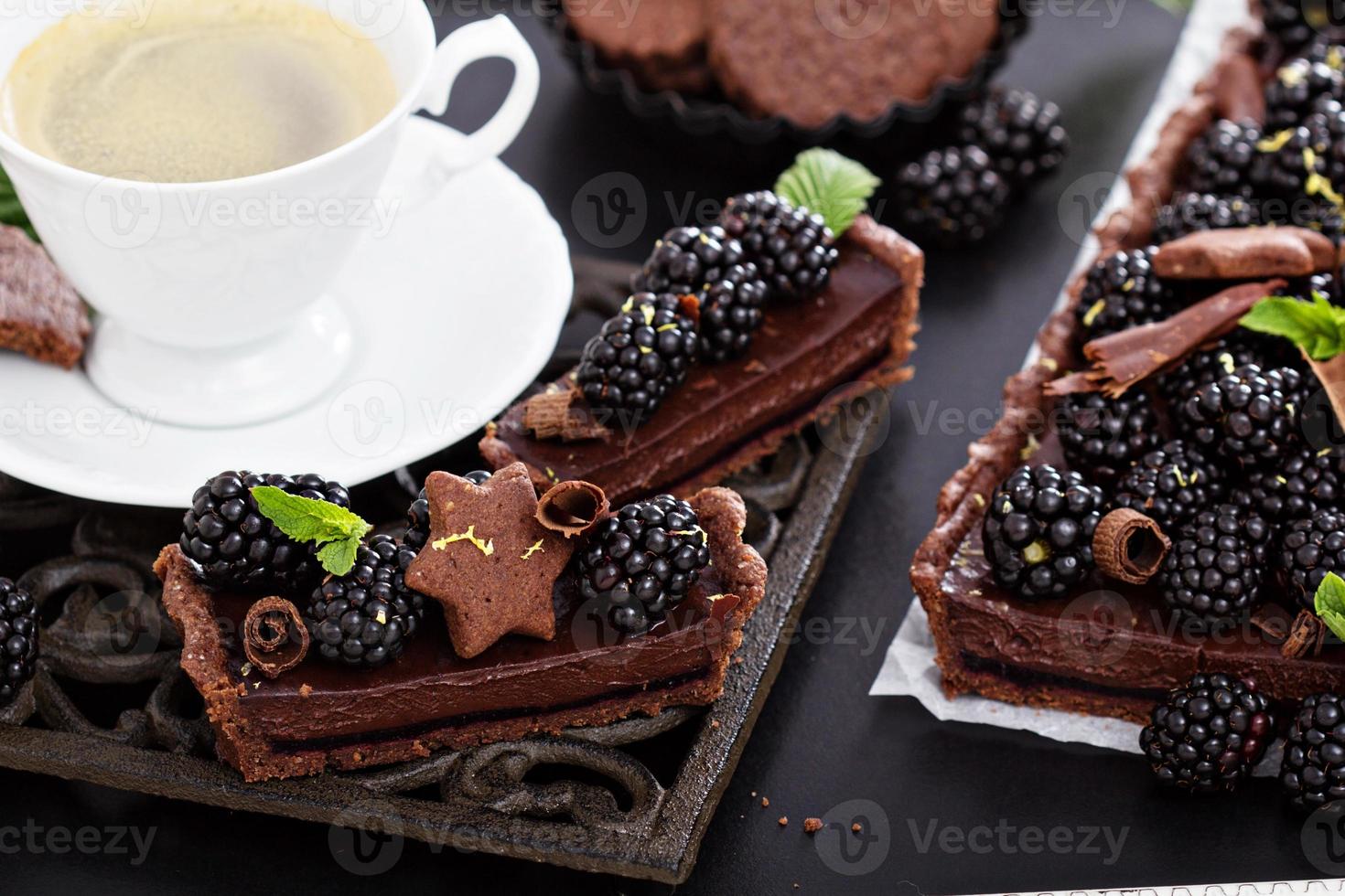 Chocolate ganache tart with blackberries photo