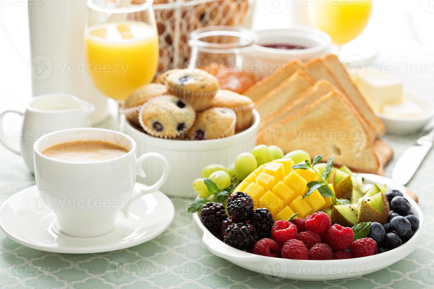 Fresh and bright continental breakfast table photo