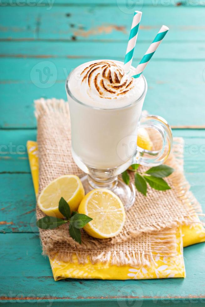 Lemon milkshake with meringue on top photo