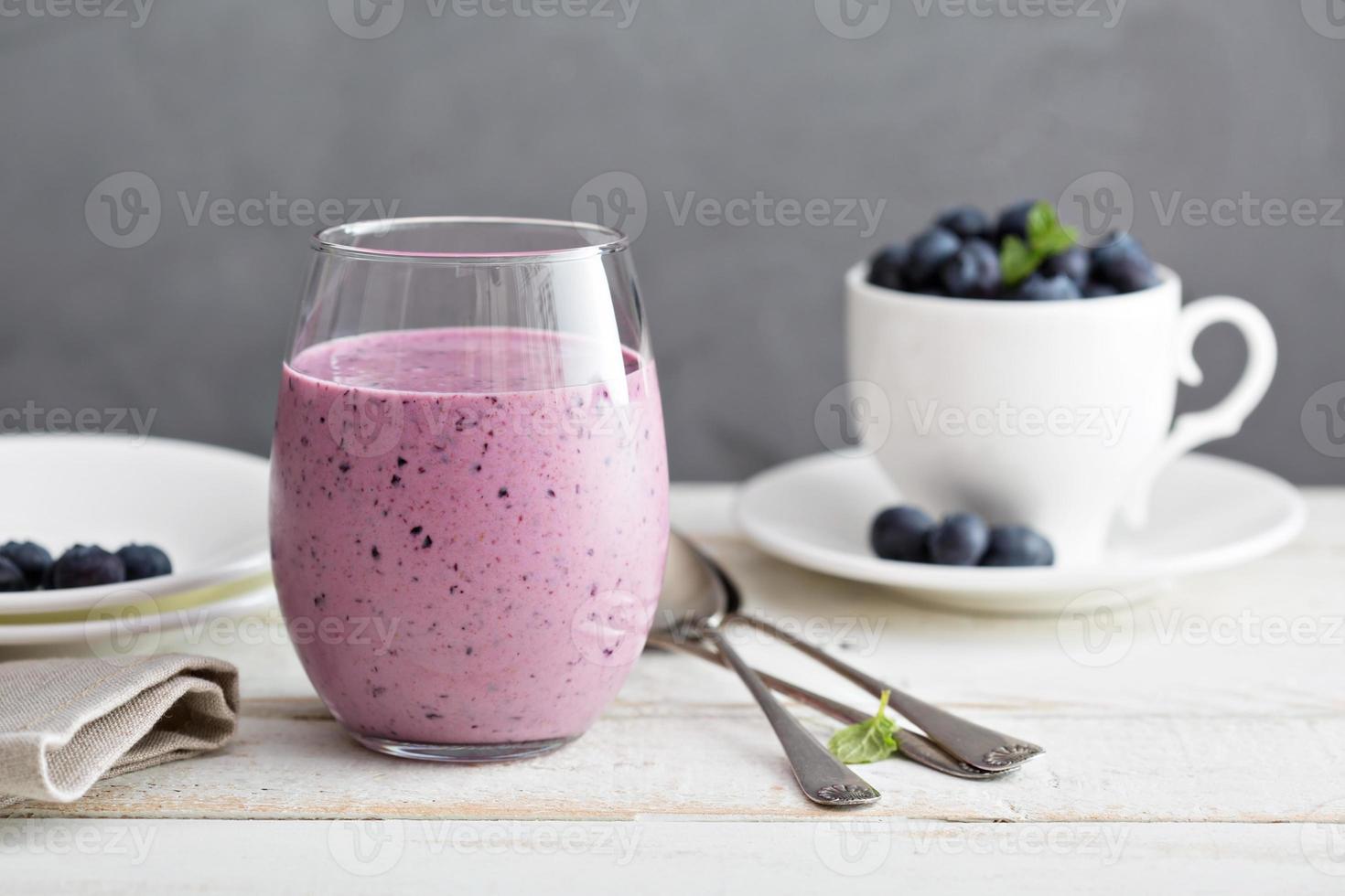 Blueberry banana smoothie in a glass photo
