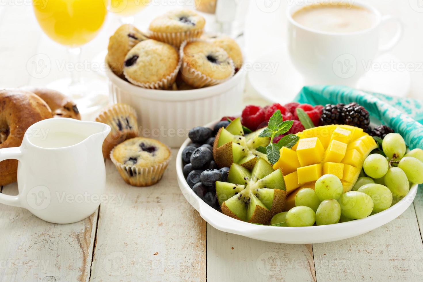 Fresh and bright continental breakfast table photo