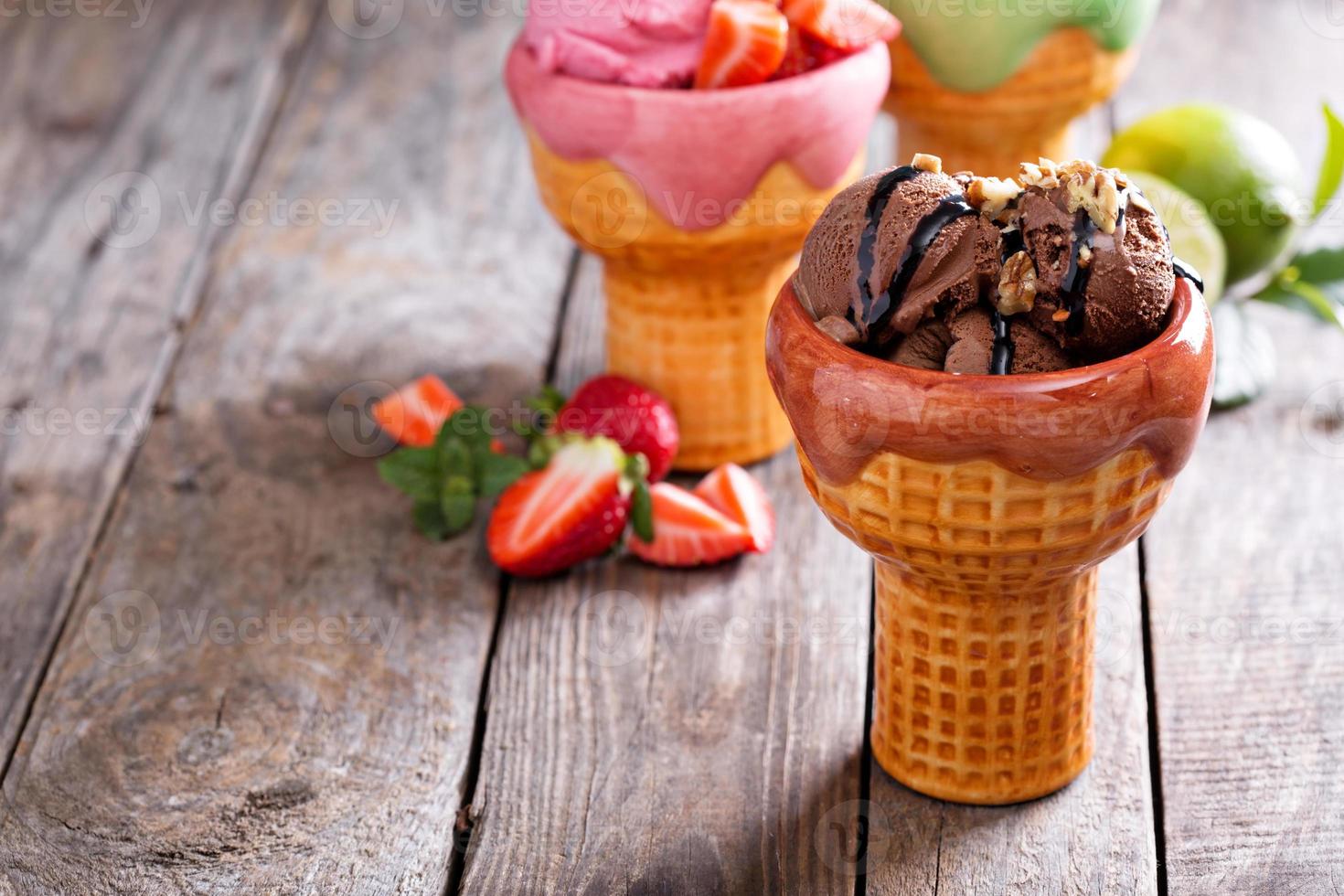 Variety of ice cream in bowls photo