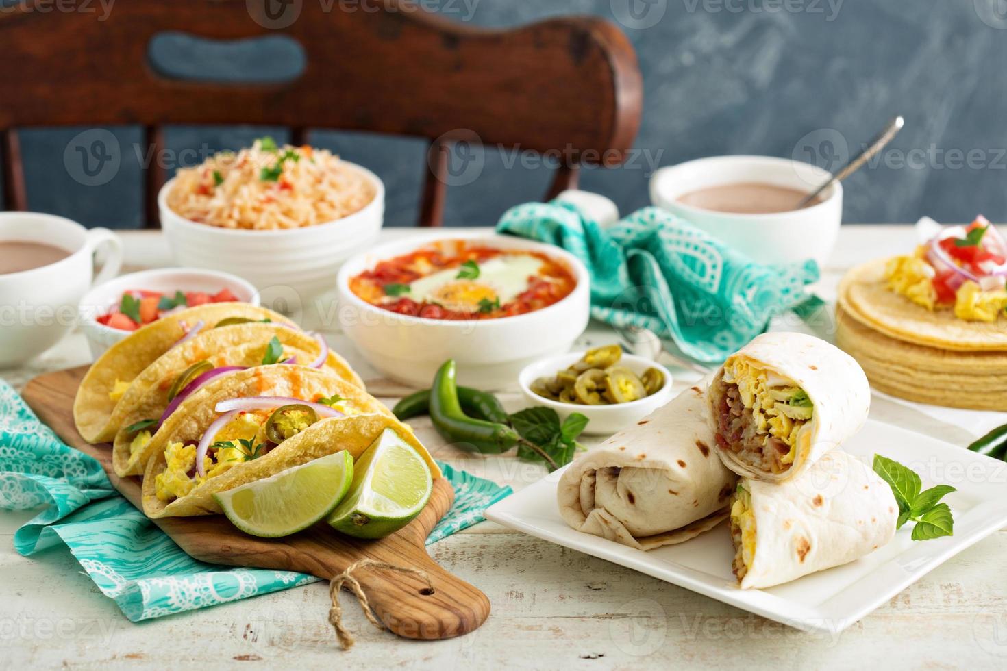 Variety of mexican cuisine dishes on a table photo