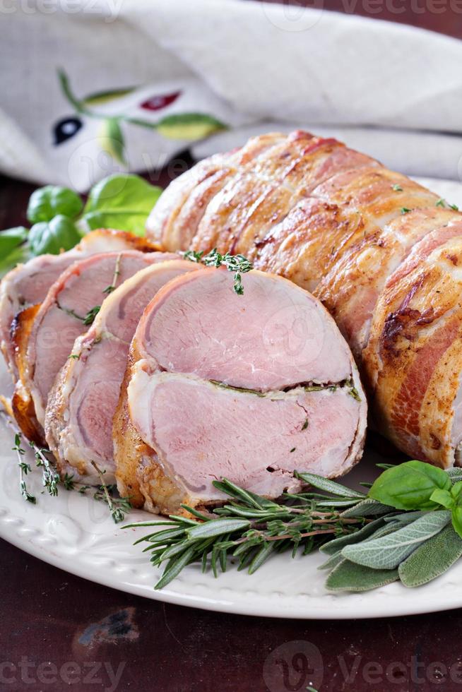 Roasted pork tenderloin with herbs photo