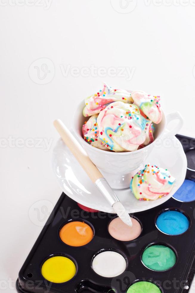 Colorful meringues rainbow colors photo