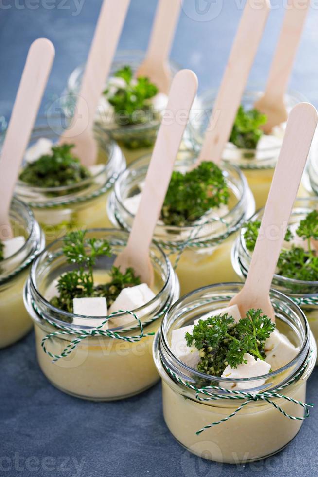 Cooked polenta with feta cheese photo