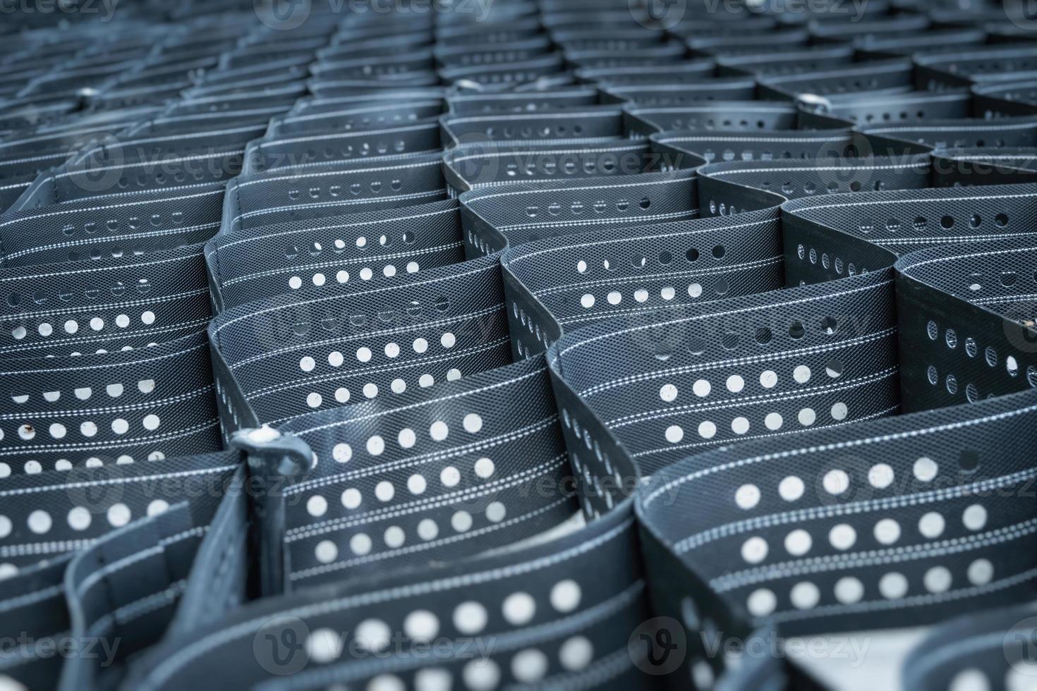 Reinforced polymer geogrid cells background. photo