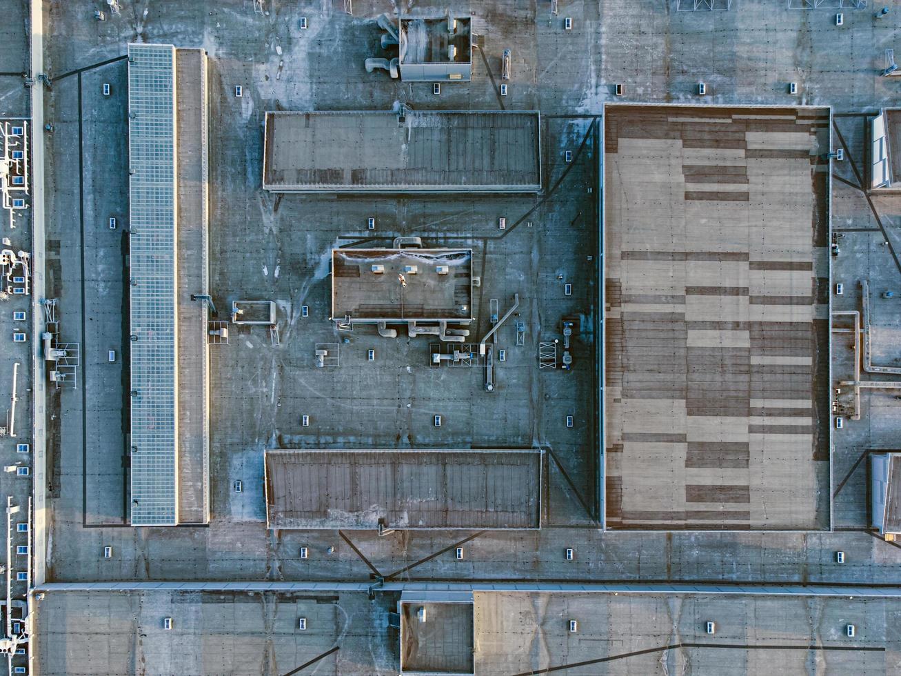 Flat roof of industrial building with engineering equipment. photo