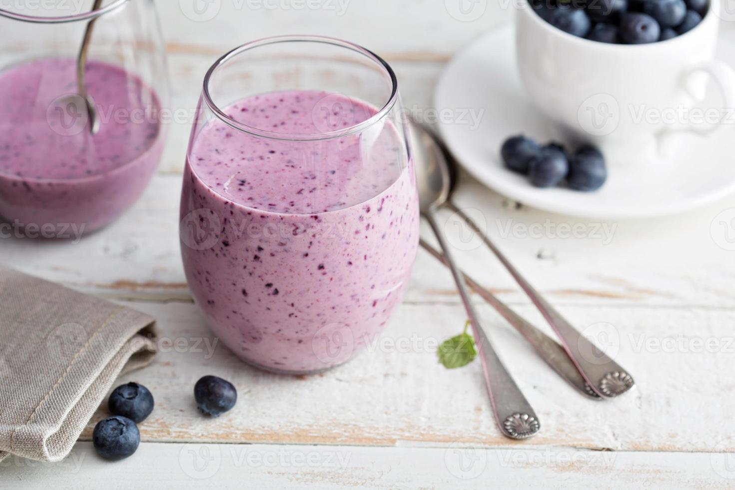 Blueberry banana smoothie in a glass photo