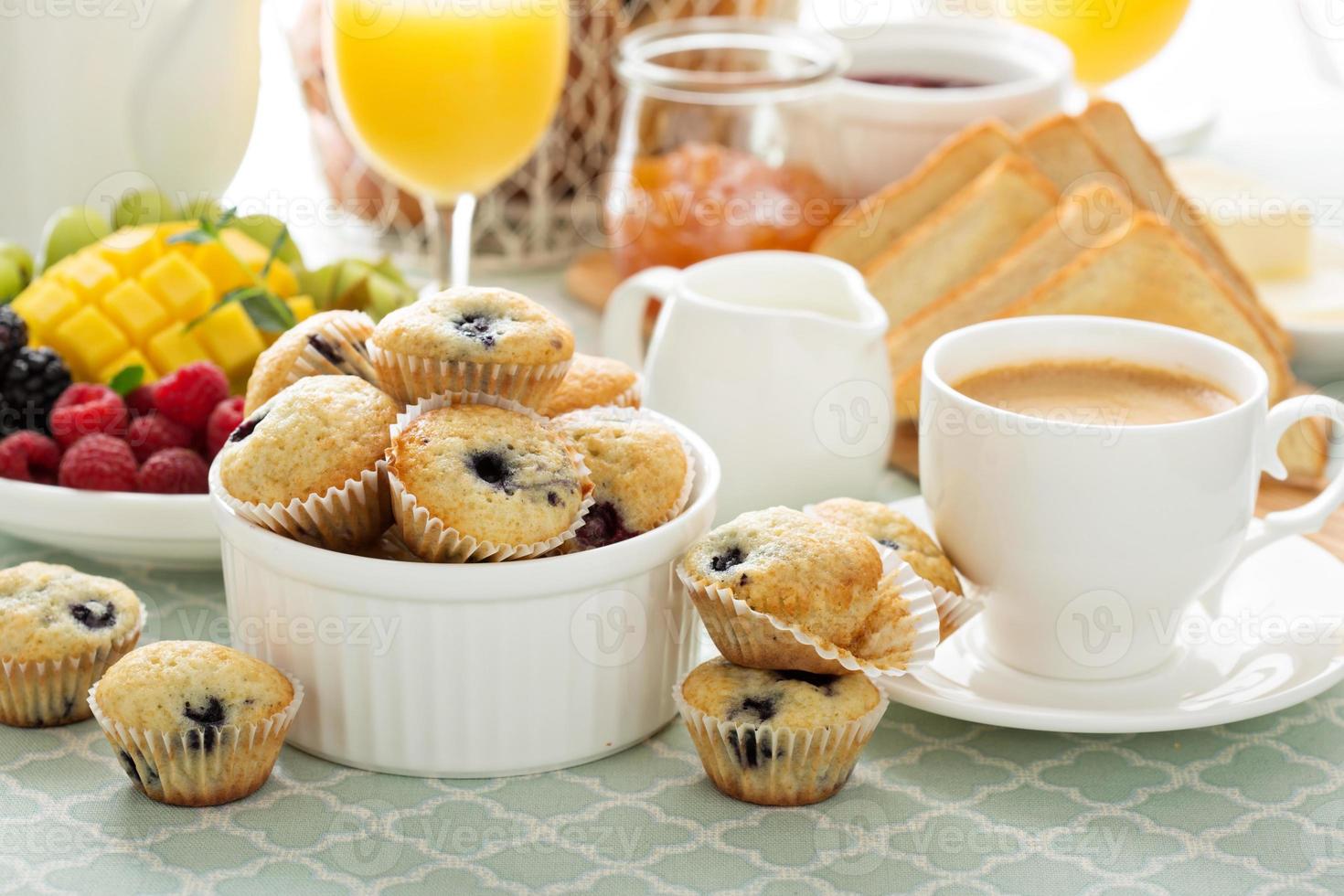 Fresh and bright continental breakfast table photo