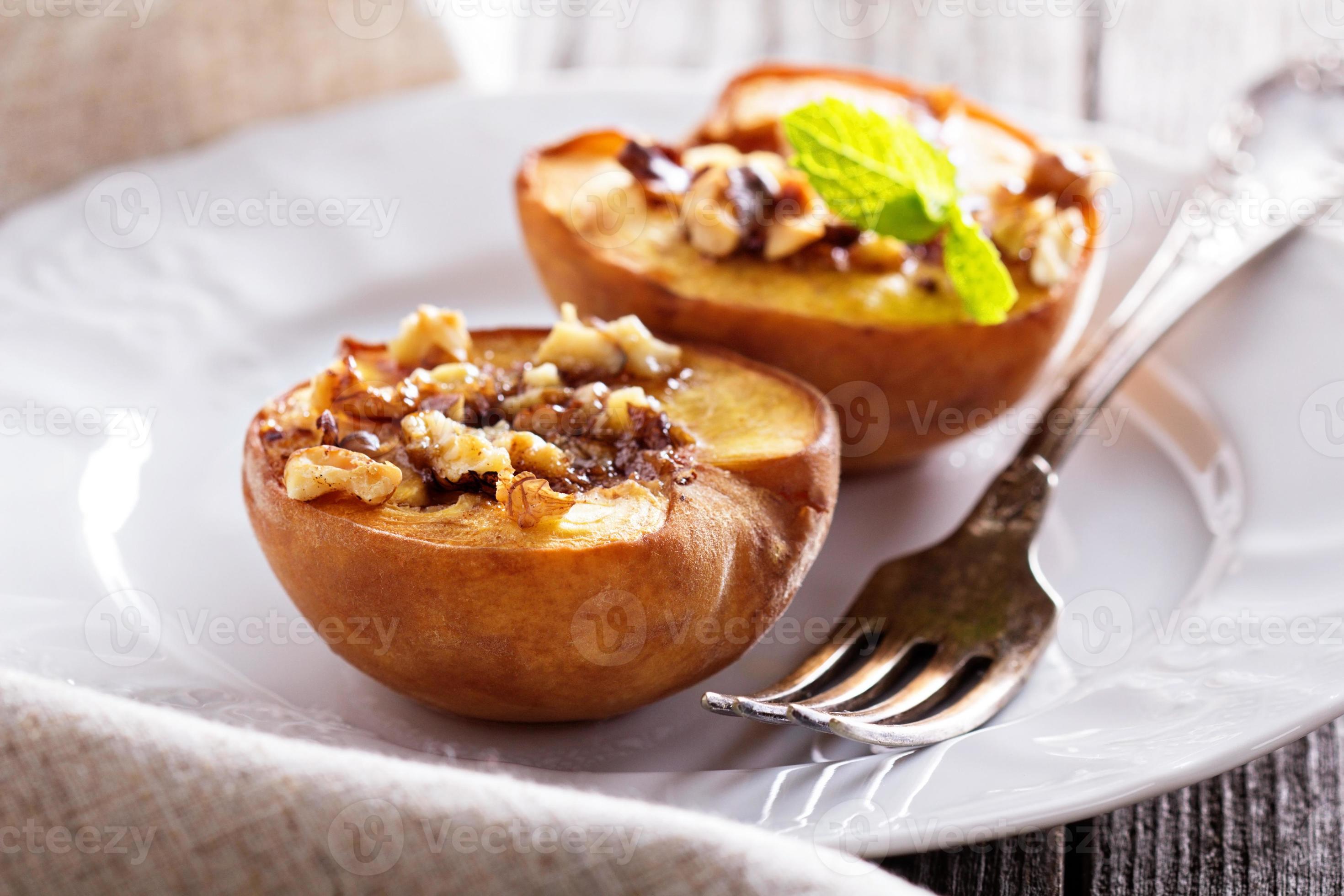 Baked peaches with sugar and nuts 15705363 Stock Photo at Vecteezy