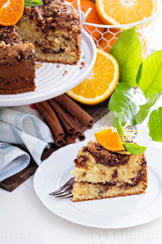 Coffee cake with oranges, nuts and chocolate photo