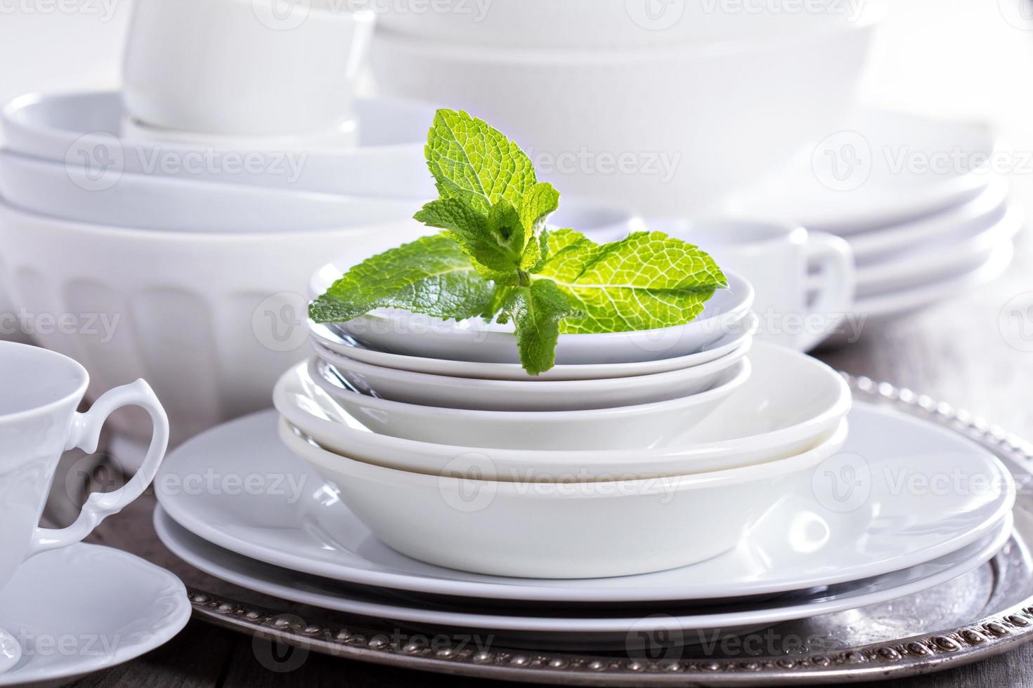 Variety of white dinnerware photo