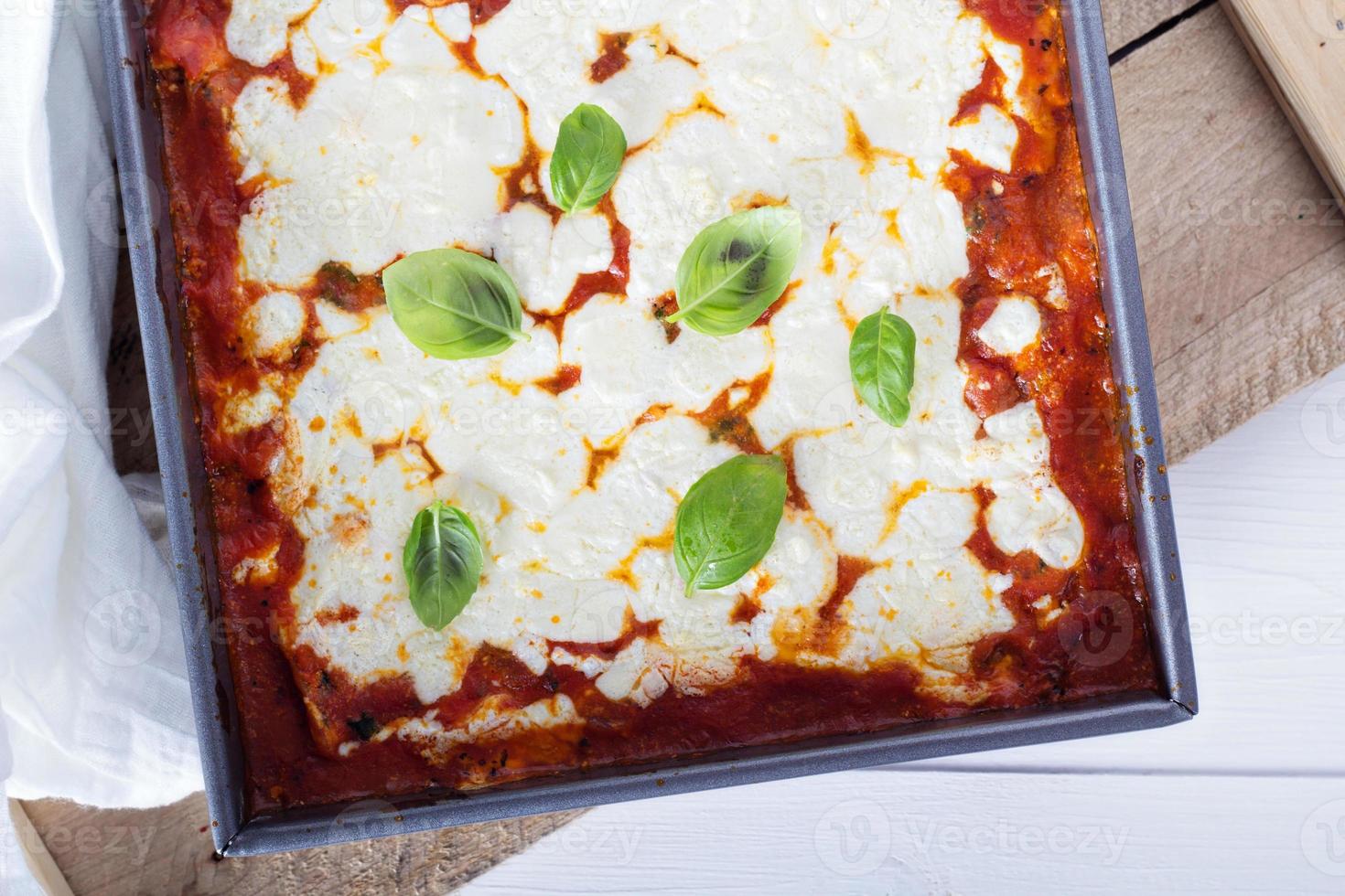 Spinach, ricotta and bacon lasagna photo