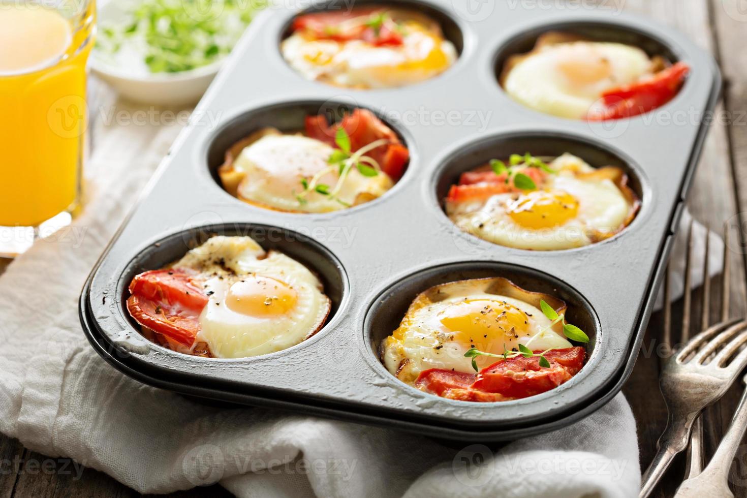 Baked eggs in maffin tin photo