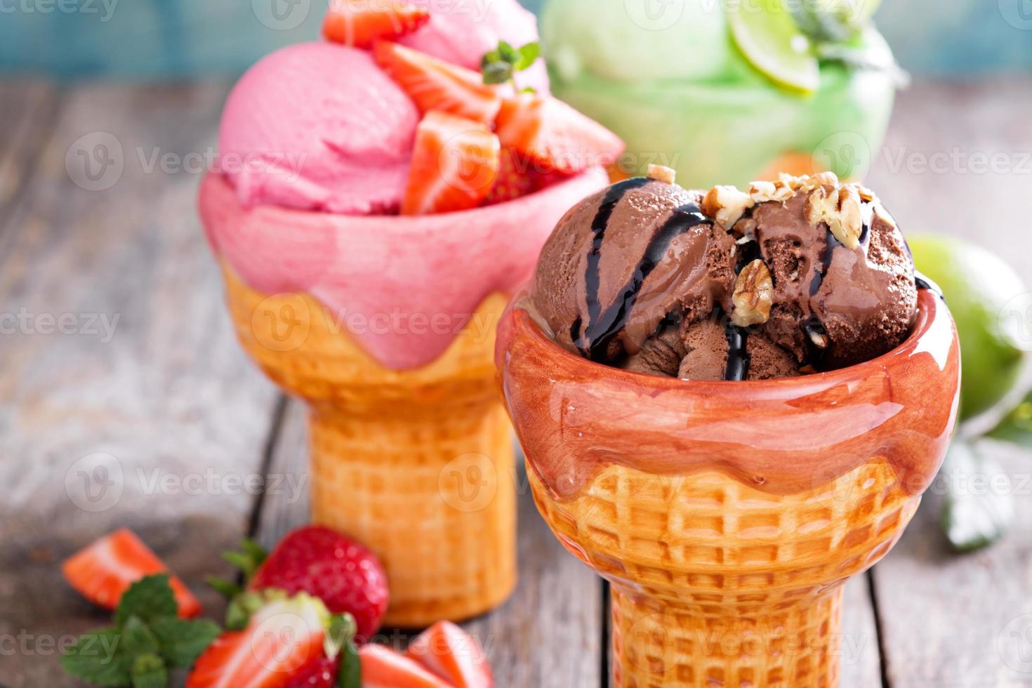 Variety of ice cream in bowls photo