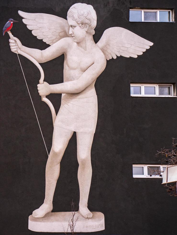 Novi Sad, Serbia, 2021 - Mural Alcyone and Eros in Novi Sad, Serbia. Mural was created by Greek artist Ficos in the name of Chain Reaction association. photo