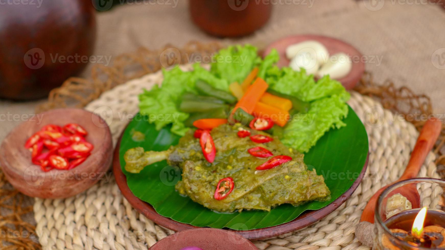 duck food with green chili complete with spices photo