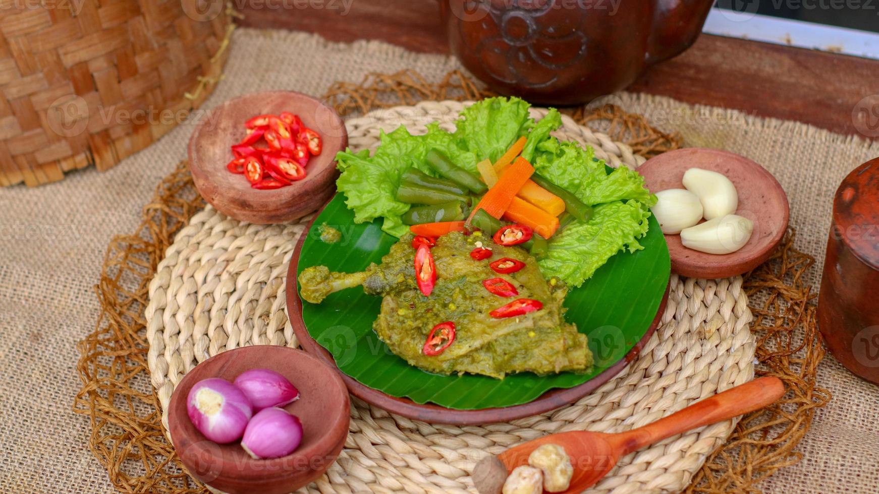 duck food with green chili complete with spices photo