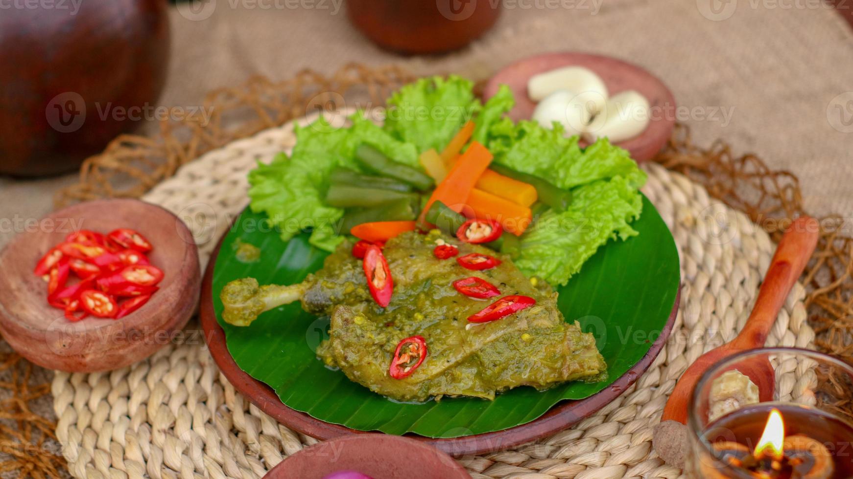 duck food with green chili complete with spices photo