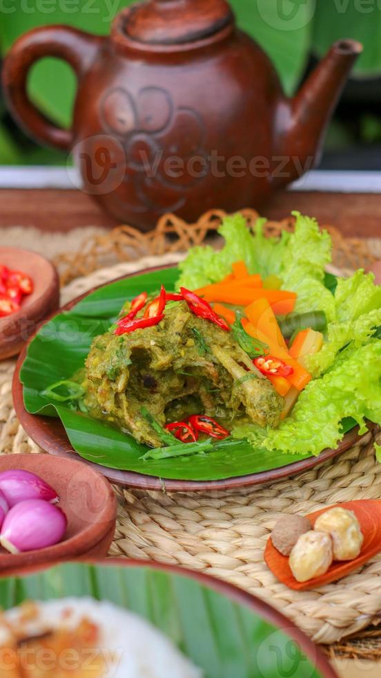 duck food with green chili complete with spices photo