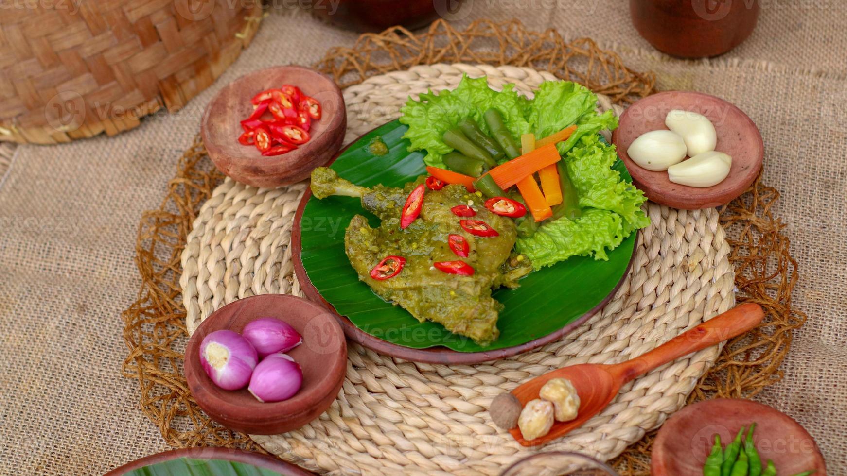 duck food with green chili complete with spices photo