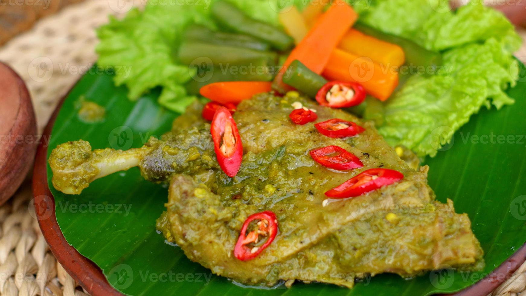 duck food with green chili complete with spices photo