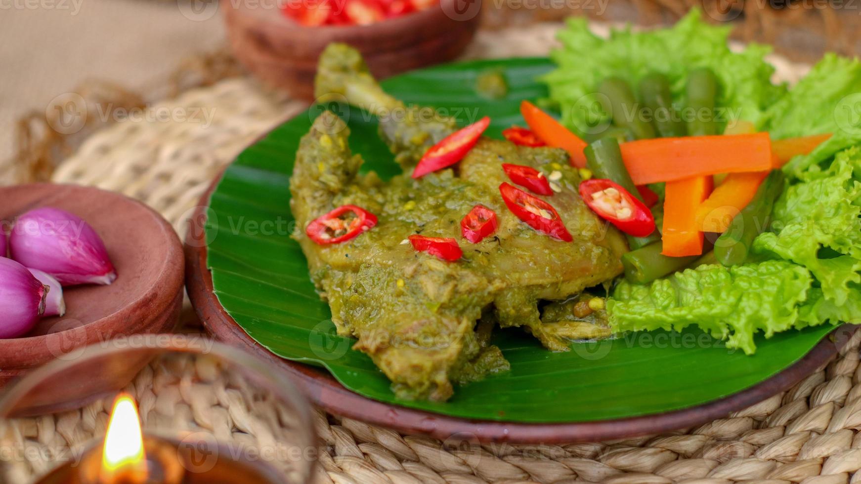 duck food with green chili complete with spices photo