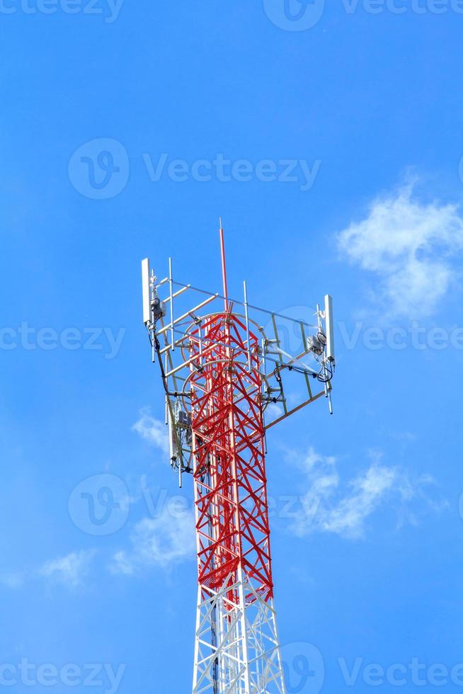 Tall telephone poles are ready to distribute Internet and telephone signals for the public to make full use of them against the background of the beautiful natural afternoon white and blue sky. photo