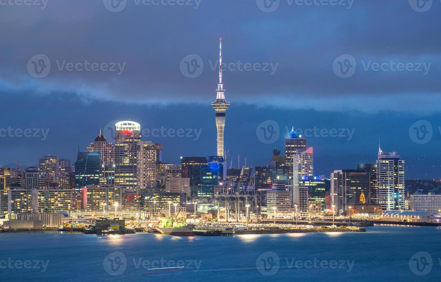 Auckland cityscape in the night time view from Devonport, New Zealand. photo