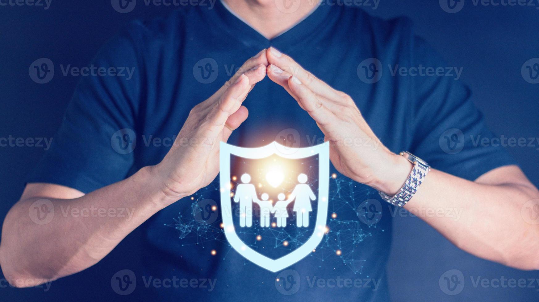 Businessman with protection gesture and family, life, health and home insurance icon. insurance concept family life insurance and policy concept photo