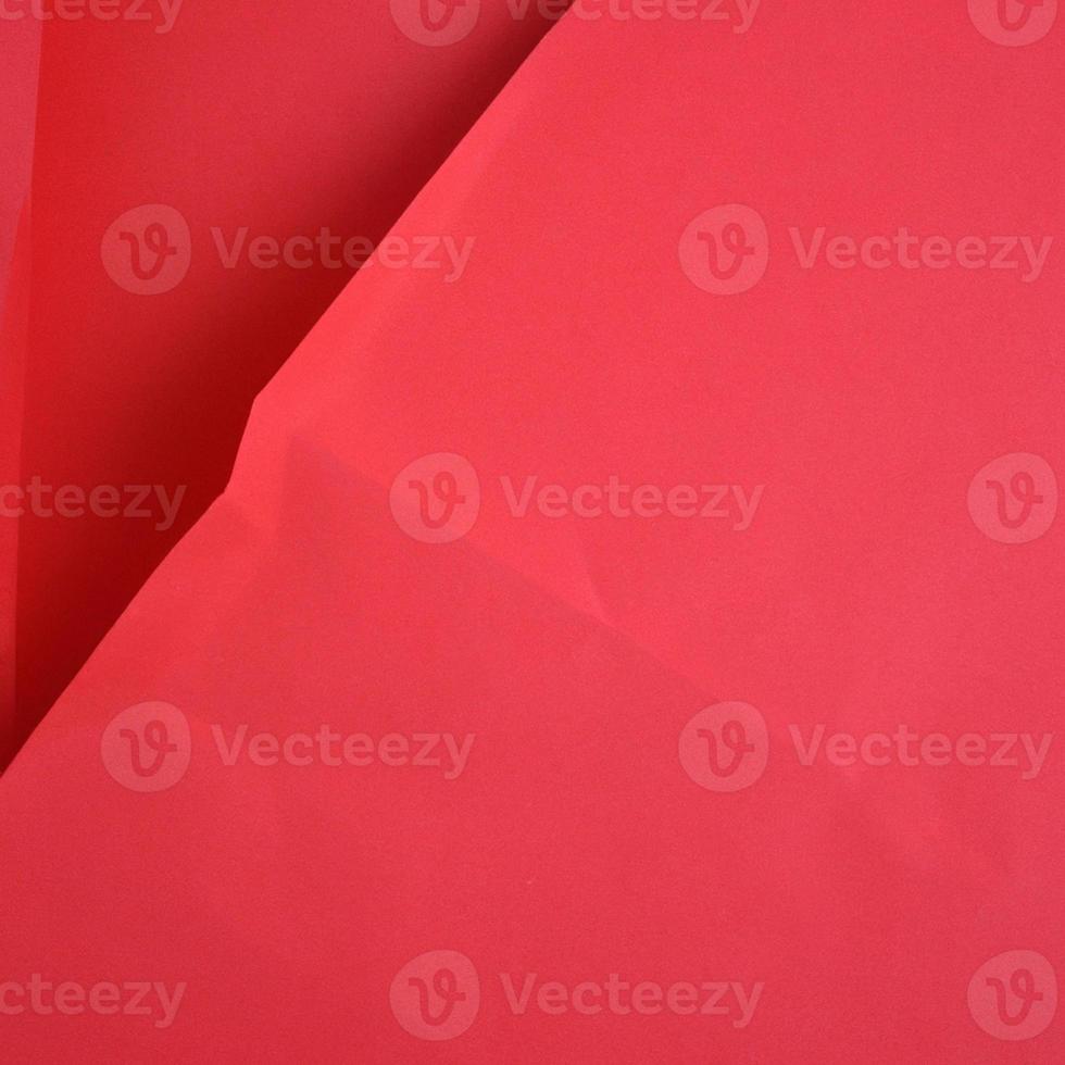 Red crumpled background paper texture. High quality background and copy space for text. photo