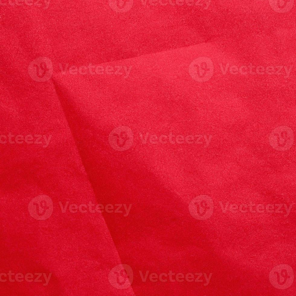 Red crumpled background paper texture. High quality background and copy space for text. photo