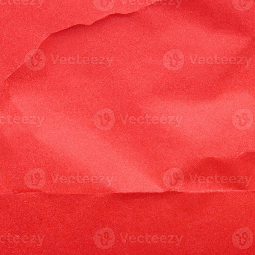 Red crumpled background paper texture. High quality background and copy space for text. photo