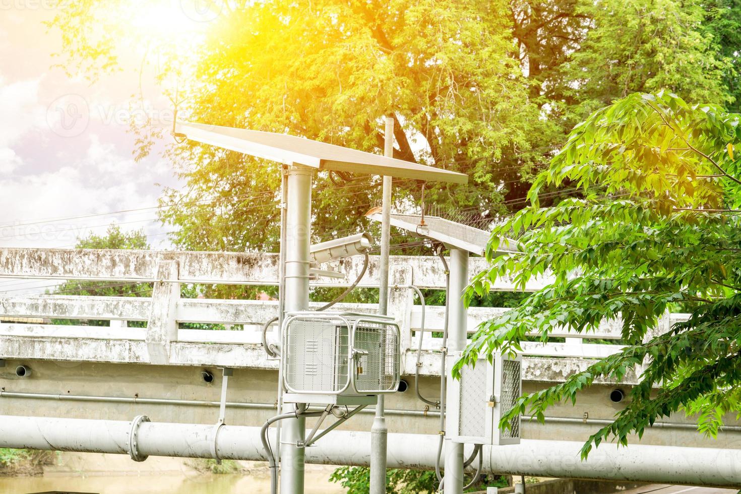 Poles and solar panels for traffic lights and CCTV cameras in many areas of the city. Now, solar cell technology is gaining popularity in many countries in saving the city's electricity. photo