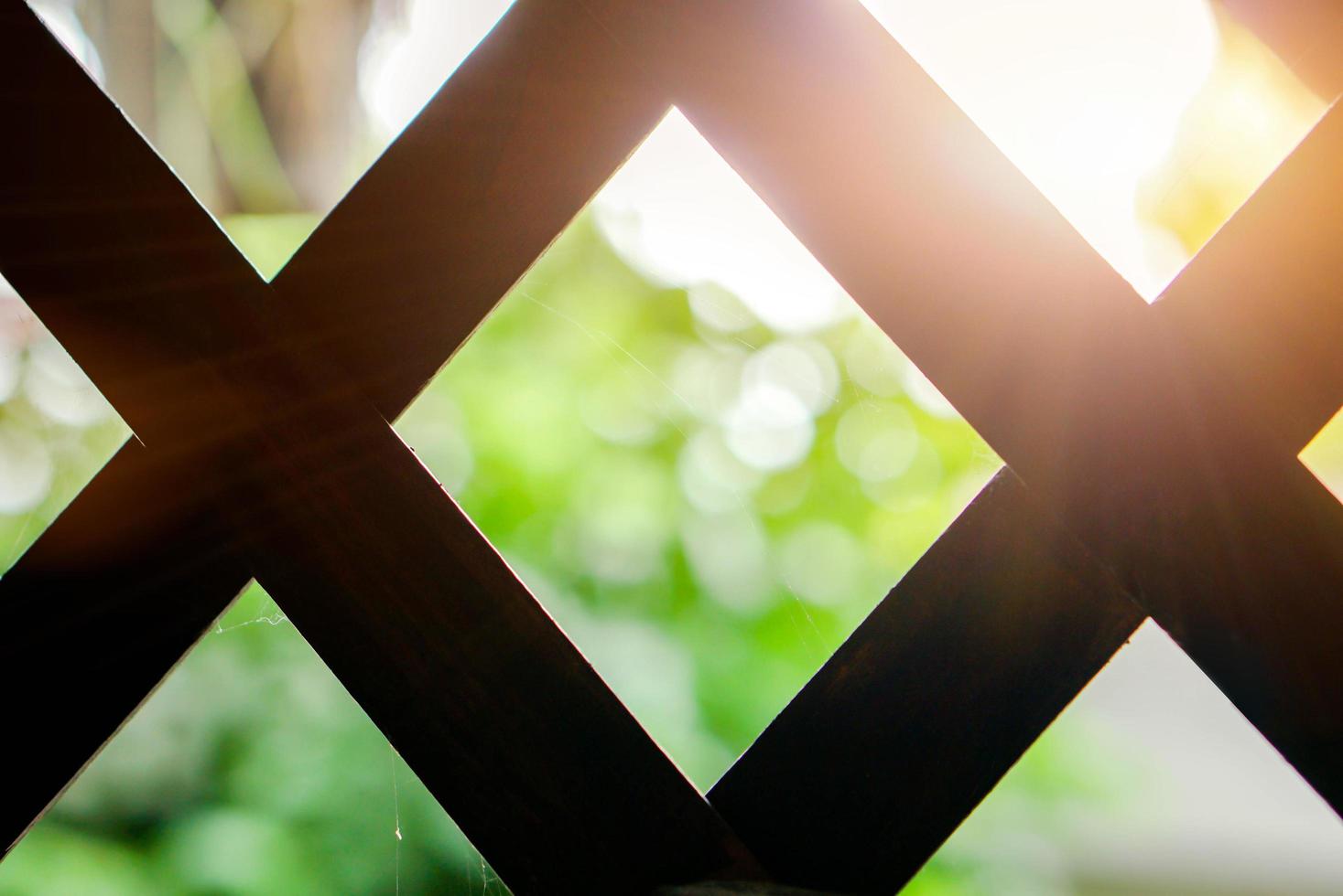 Blur and bokeh outside view of the house looked from inside and pass of house vent. photo